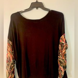 Women’s Chico Blouse size XXL new with tags. Black with pattern sleeve.